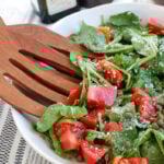 Arugula Salad with Capers in white bowl