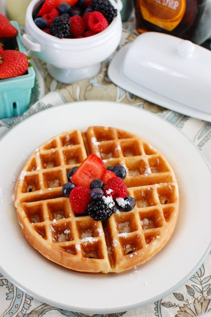 Greek Yogurt Waffles with powdered sugar and berries