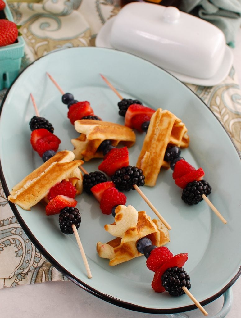 Greek Yogurt Waffles with berries on teal platter