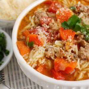 Italian Sausage Soup in a white bowl