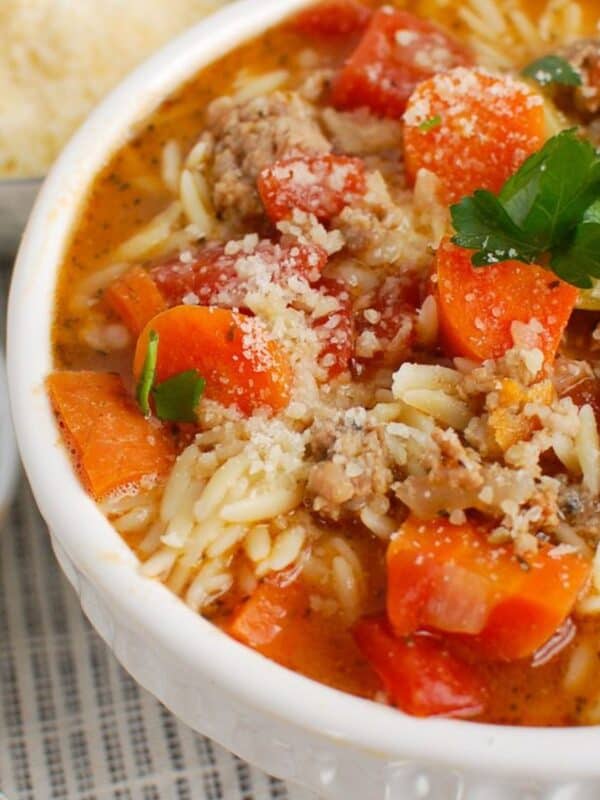 Italian Sausage Soup in a white bowl