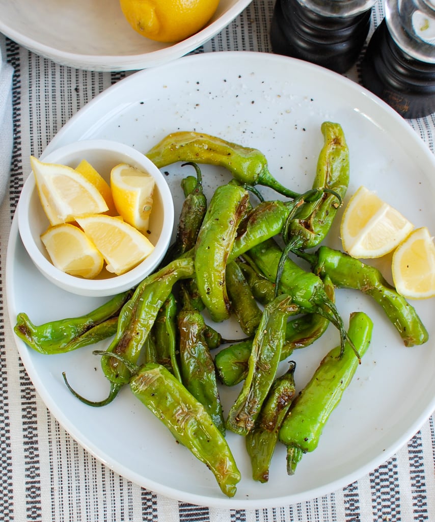 Shishito Peppers on white plate