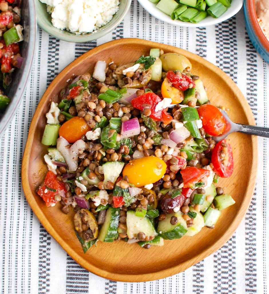 Mediterranean Lentil Salad on a wooden bowl