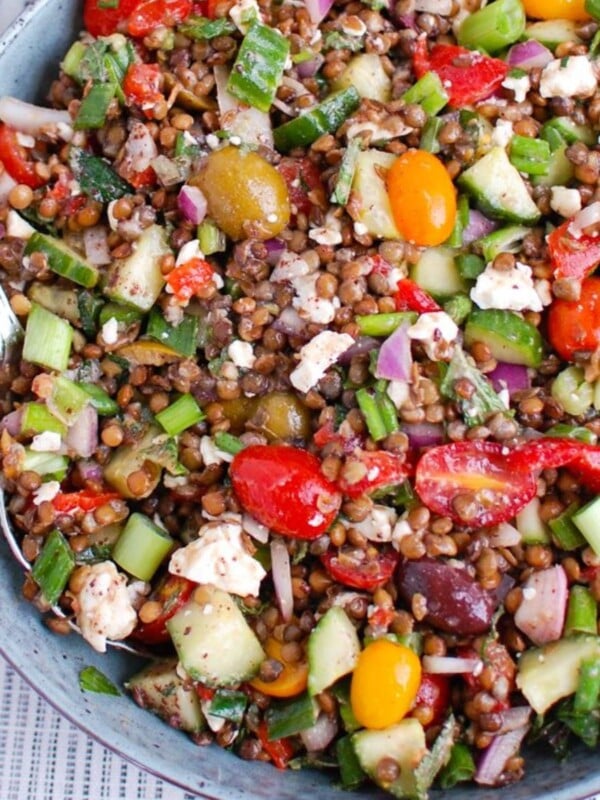 Mediterranean Lentil Salad in a bowl with a spoon
