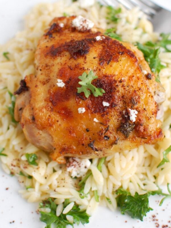 Mediterranean Chicken on a white plate with parsley