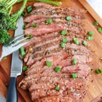 Asian Marinated Flank Steak on cutting board
