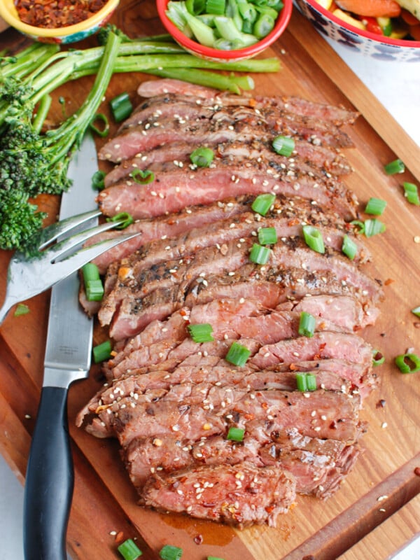 Asian Marinated Flank Steak on cutting board