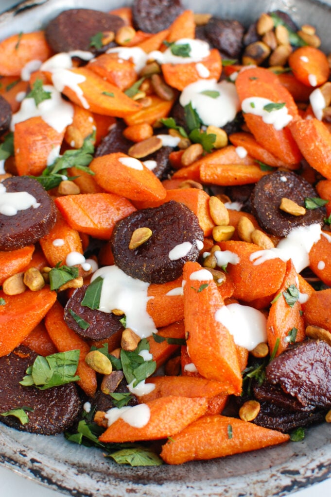 Roasted Carrots and Beets with Tahini with spoon