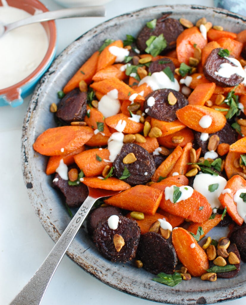 Roasted Carrots and Beets with Tahini on plate