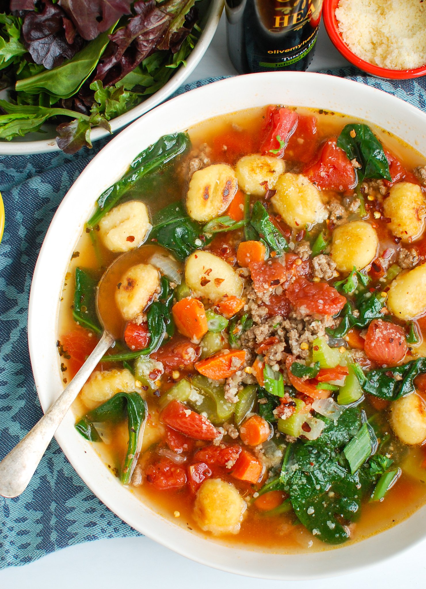 Easy Sausage Gnocchi Soup with blue napkin