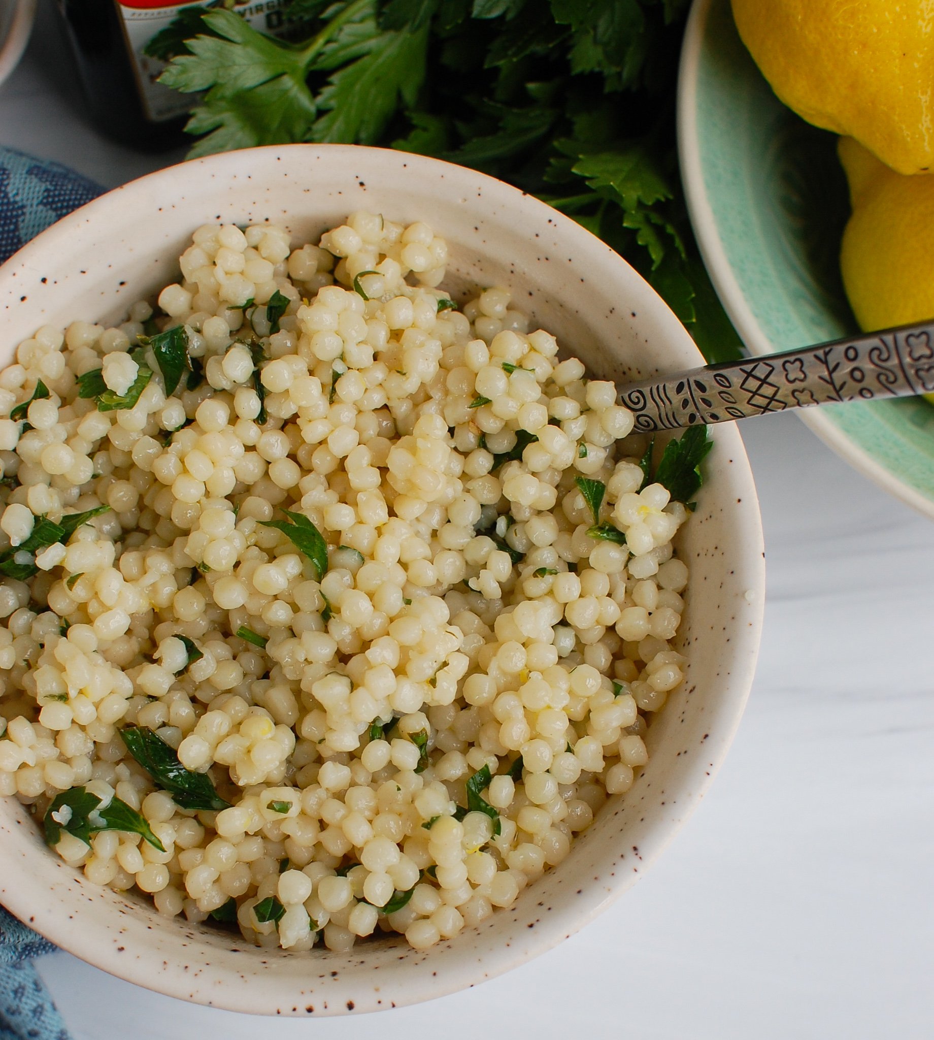 Lemon Pearl Couscous Recipe with spoon.