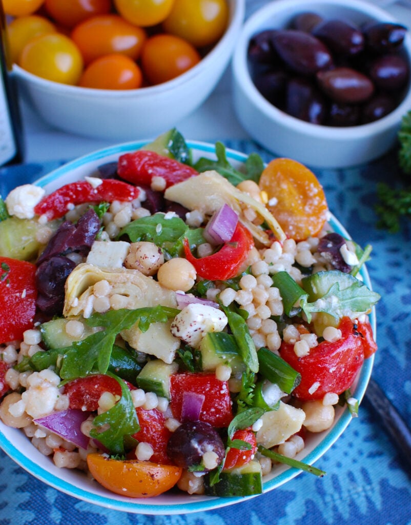 Mediterranean Couscous Salad in small white bowll
