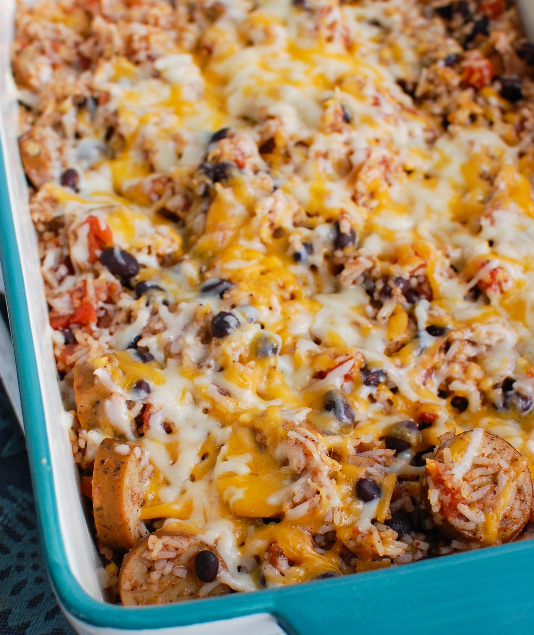 Sausage and Bean Casserole in a teal dish