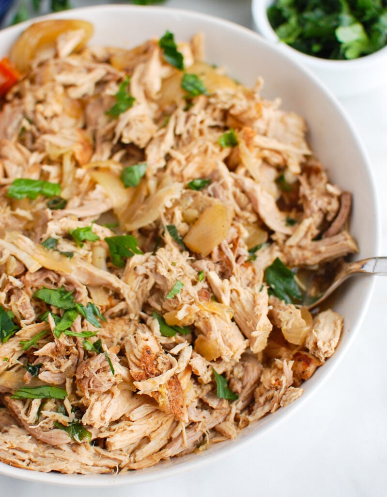 Slow Cooker Pork Roast shredded in a bowl