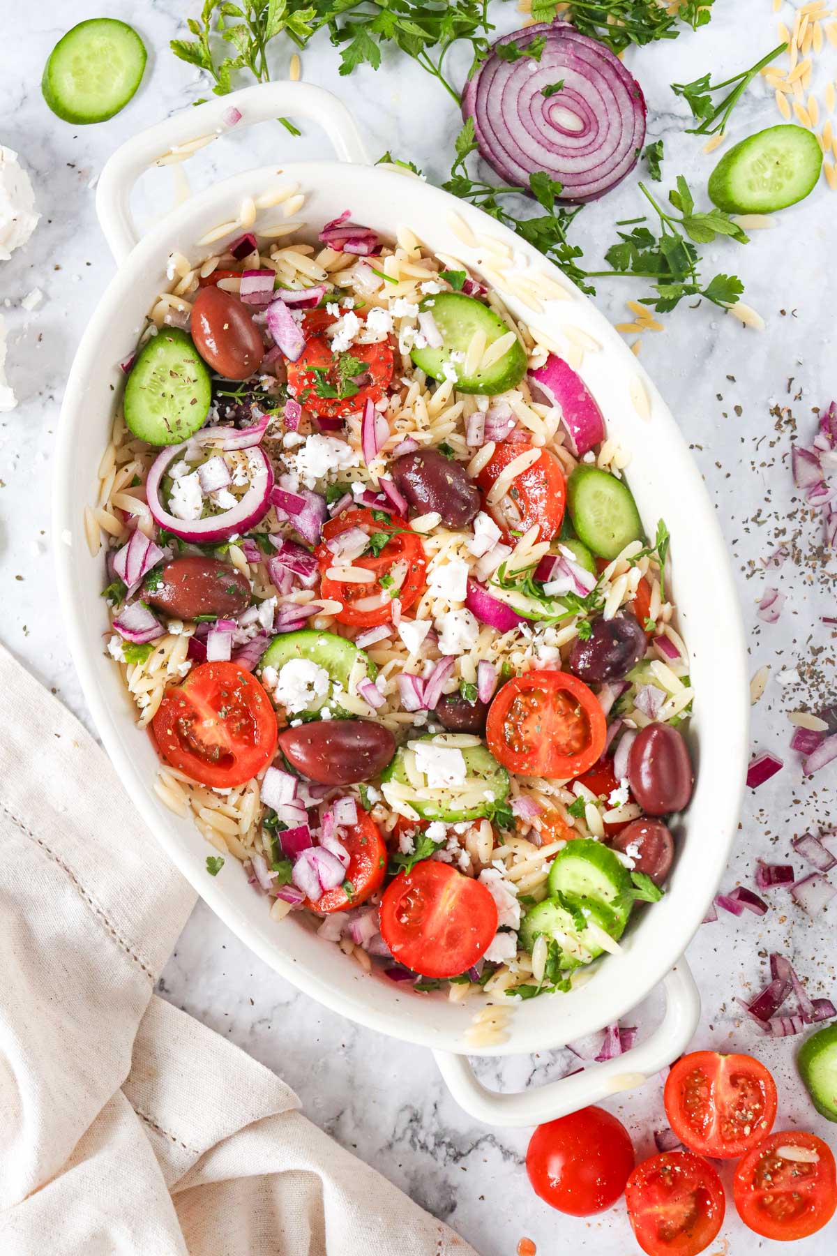 Greek Orzo Pasta Salad in white bowls