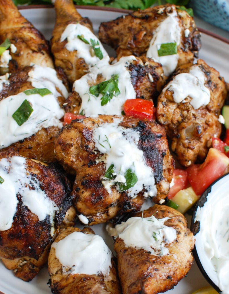 Mediterranean Grilled Chicken with Dill Greek Yogurt Sauce on platter