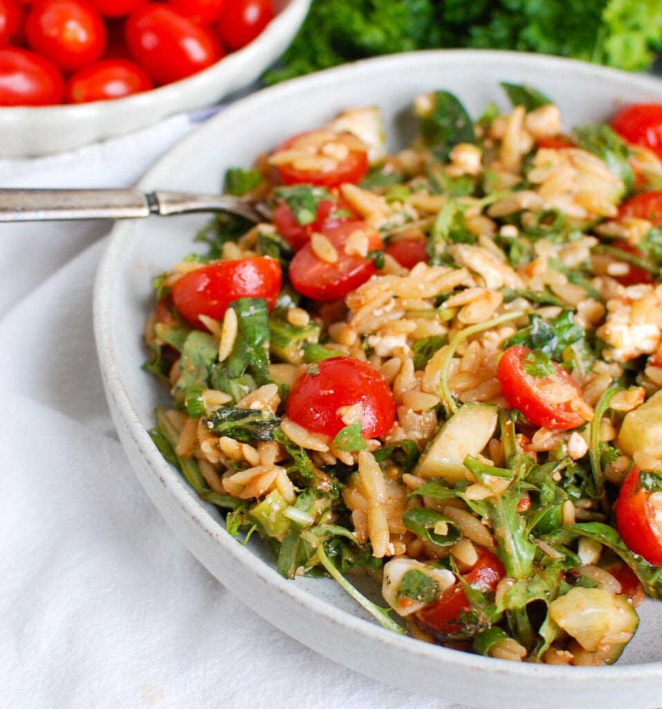 Tomato Feta Orzo Salad with fork