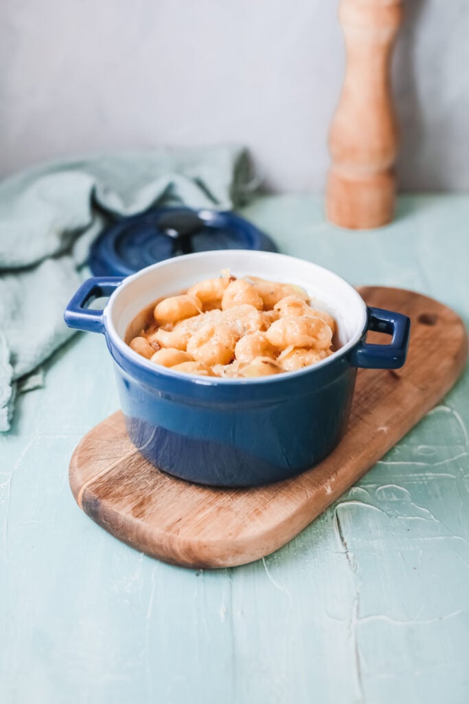 One Pot French Onion Gnocchi in blue pot