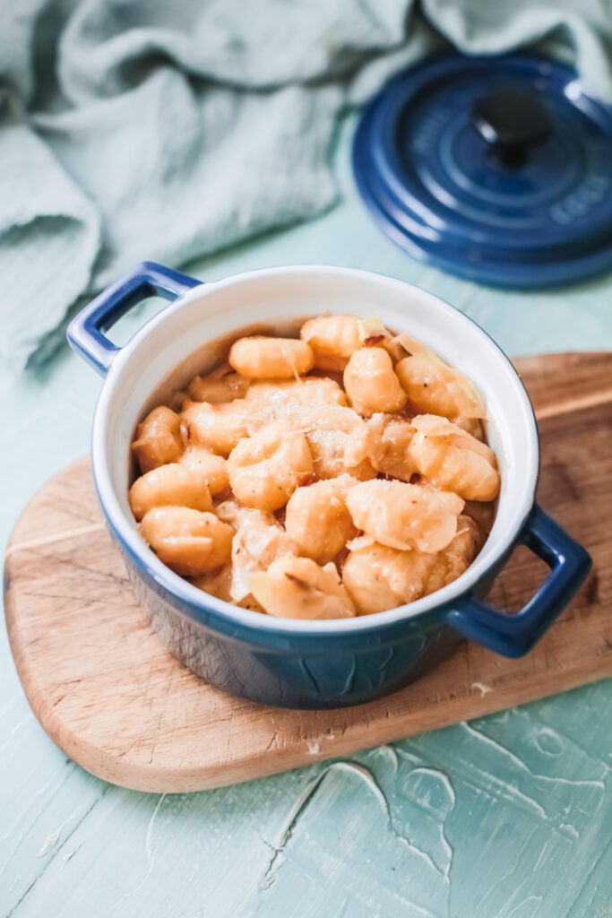 One Pot French Onion Gnocchi in blue bowl