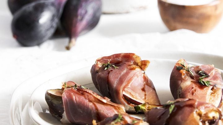 Goat Cheese Figs Wrapped in Prosciutto on plate