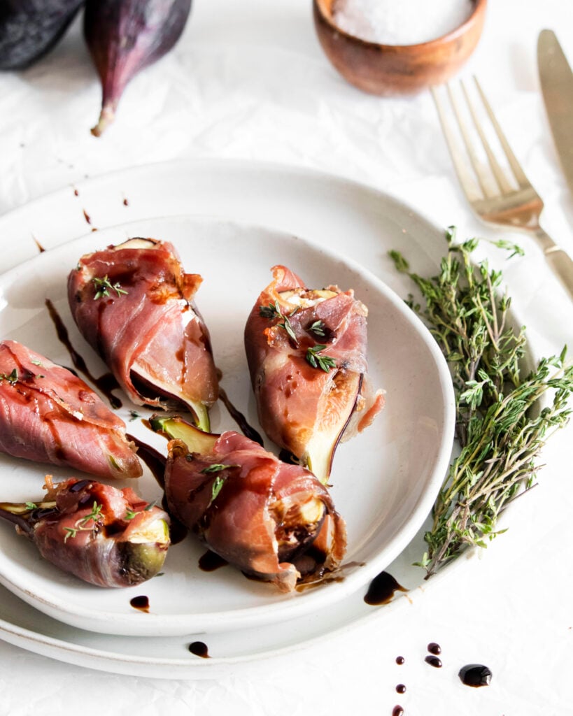 Goat Cheese Figs Wrapped in Prosciutto with fork 