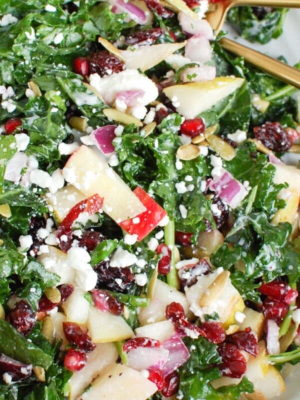 Easy Fall Salad on a white platter with gold spoon