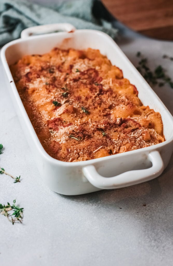 Pumpkin Mac and Cheese in white baking dish 