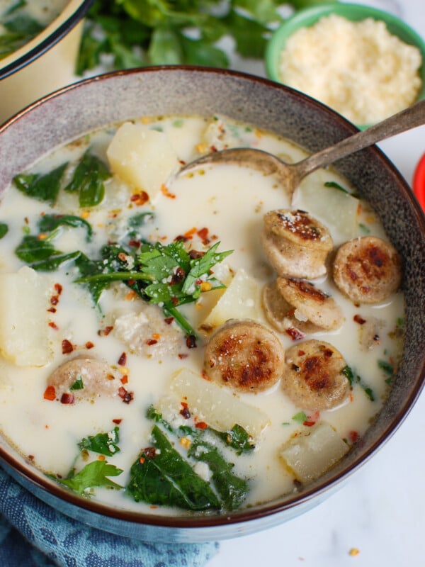 Slow Cooker Zuppa Toscana with spoon
