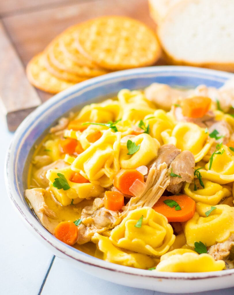 Chicken Tortellini Soup in blue bowl