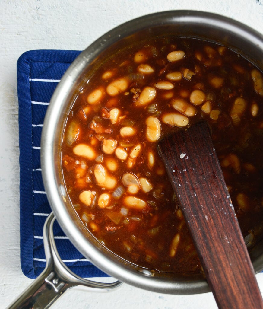 Easy Bacon Baked Beans with spoon 