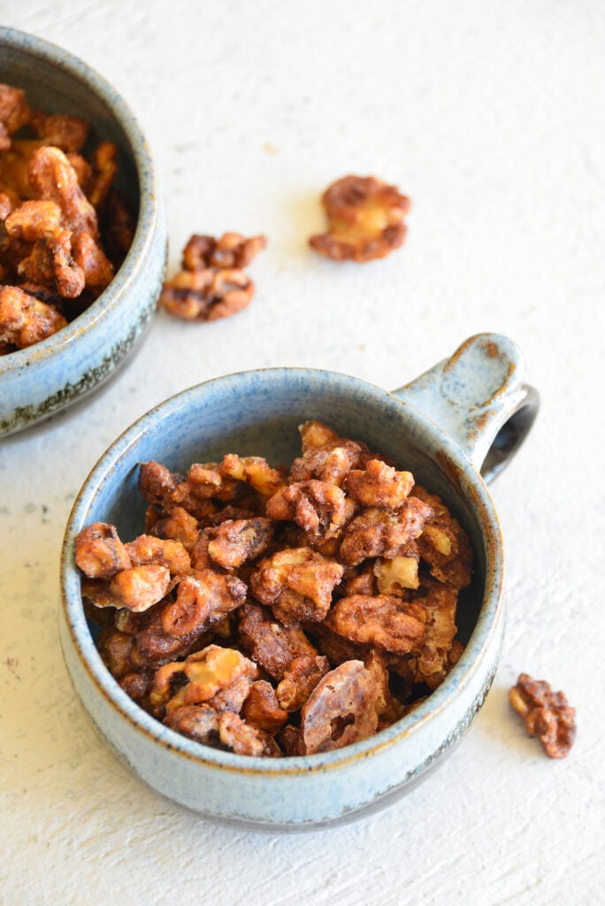 Easy Candied Walnuts in a teal bowl 