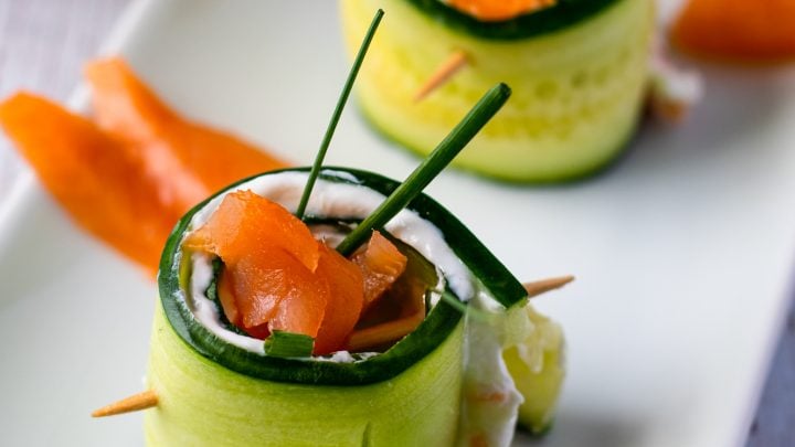 Smoked Salmon Cucumber Appetizer Bites on white platter