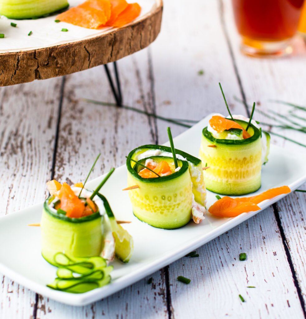 Smoked Salmon Cucumber Appetizer Bites on white plate 