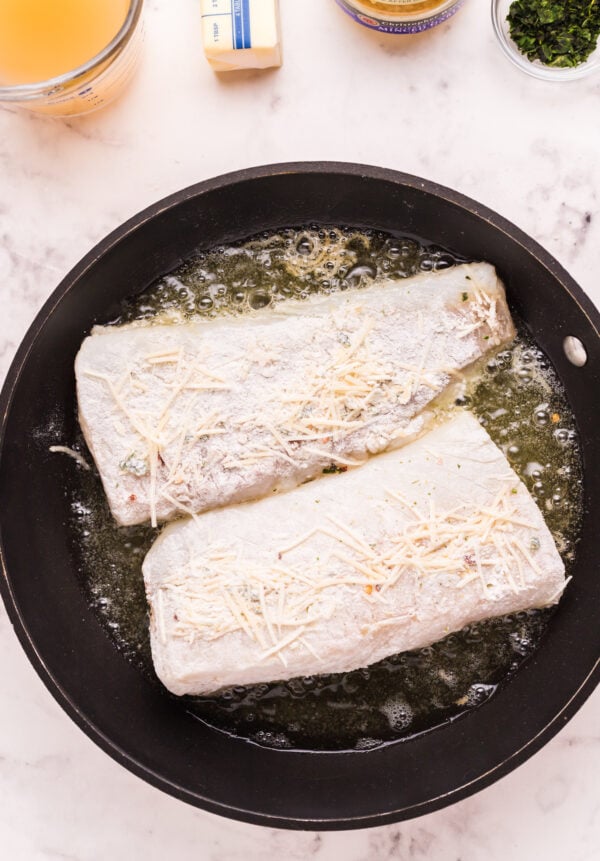 Pan Fried Garlic Butter Cod in skillet