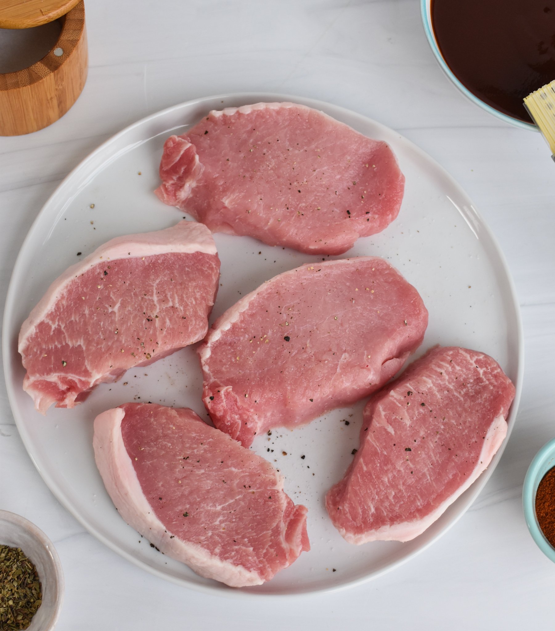 BBQ Baked Pork Chops ingredients on a table.
