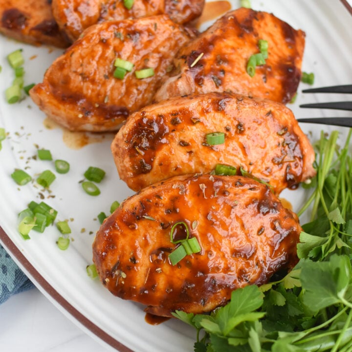 BBQ Baked Pork Chops on a white platter.
