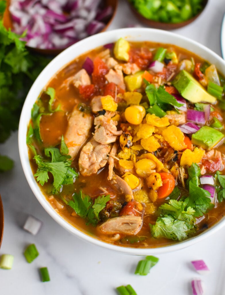 Green Chili Chicken Soup in white bowl 