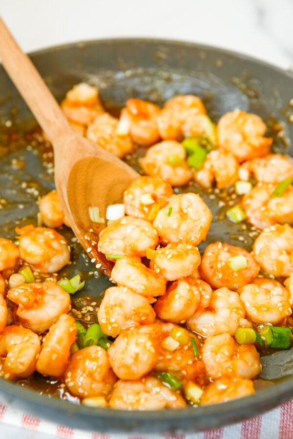 Honey Garlic Sriracha Shrimp with spoon