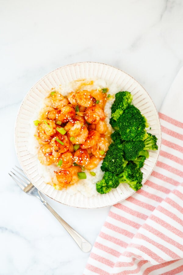 Honey Garlic Sriracha Shrimp on white plate
