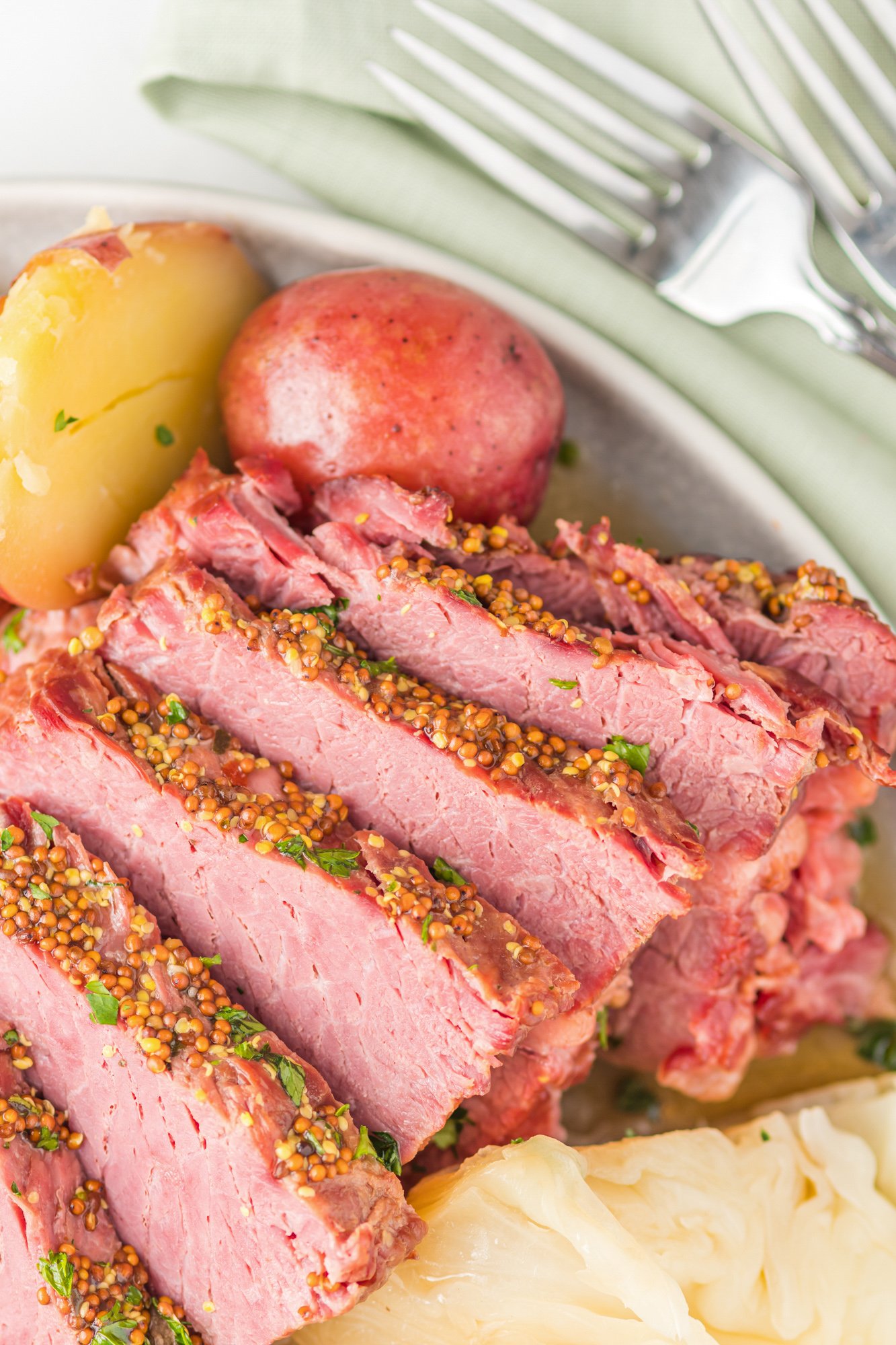 Instant Pot Corned Beef and Cabbage on white plate 