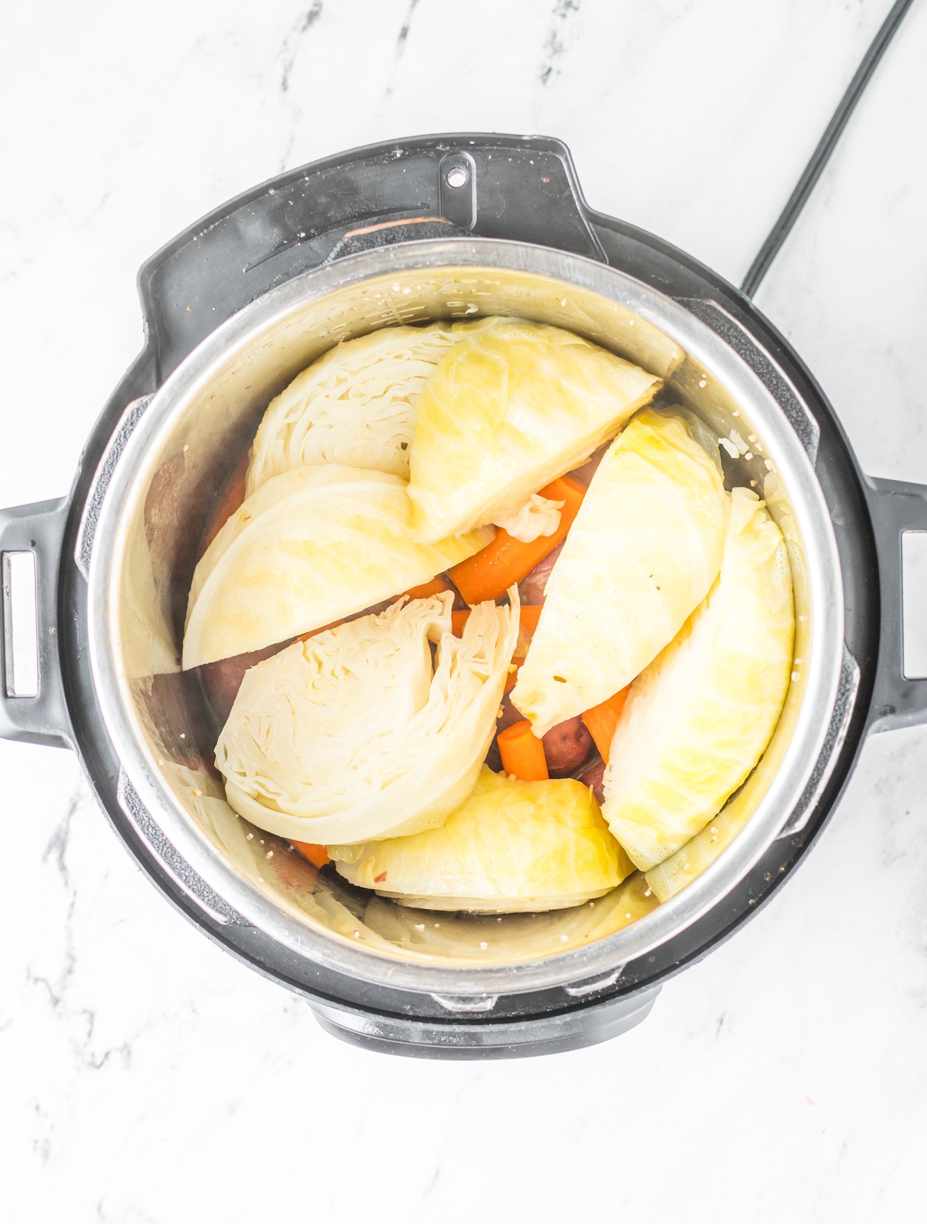 Instant Pot Corned Beef and Cabbage in pressure cooker