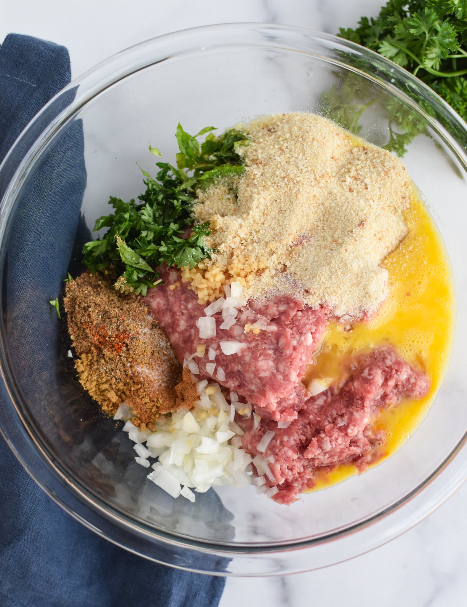 Lamb Kofta ingredients in a mixing bowl.