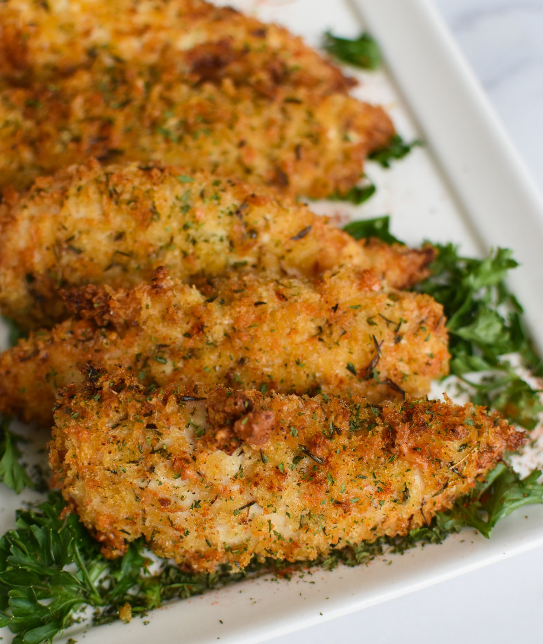 Air Fryer Chicken Tenders on a long white platter.