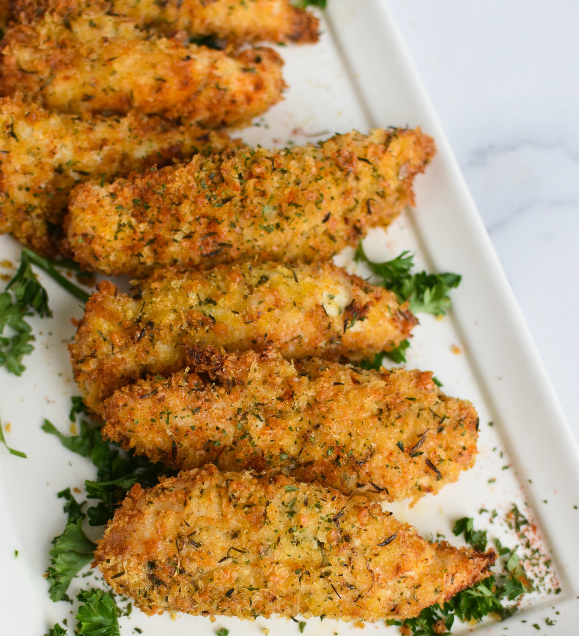 Air Fryer Chicken Tenders on white plate