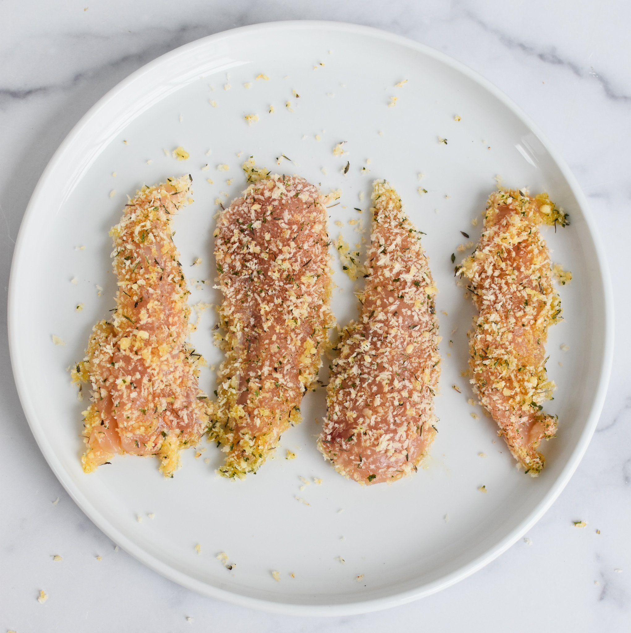 Air Fryer Chicken Tenders chicken tenders coated in panko breadcrumbs.