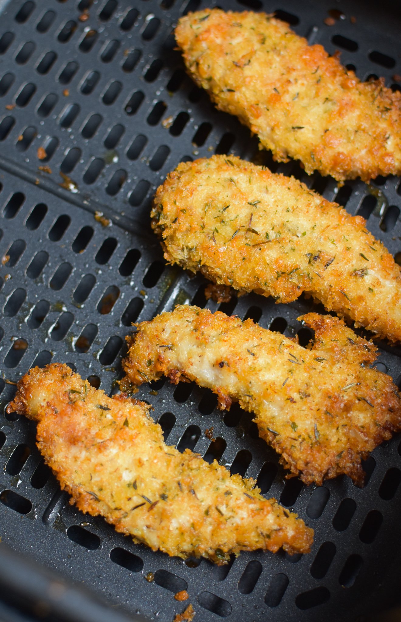 Air Fryer Chicken Tenders chicken in the air fryer.