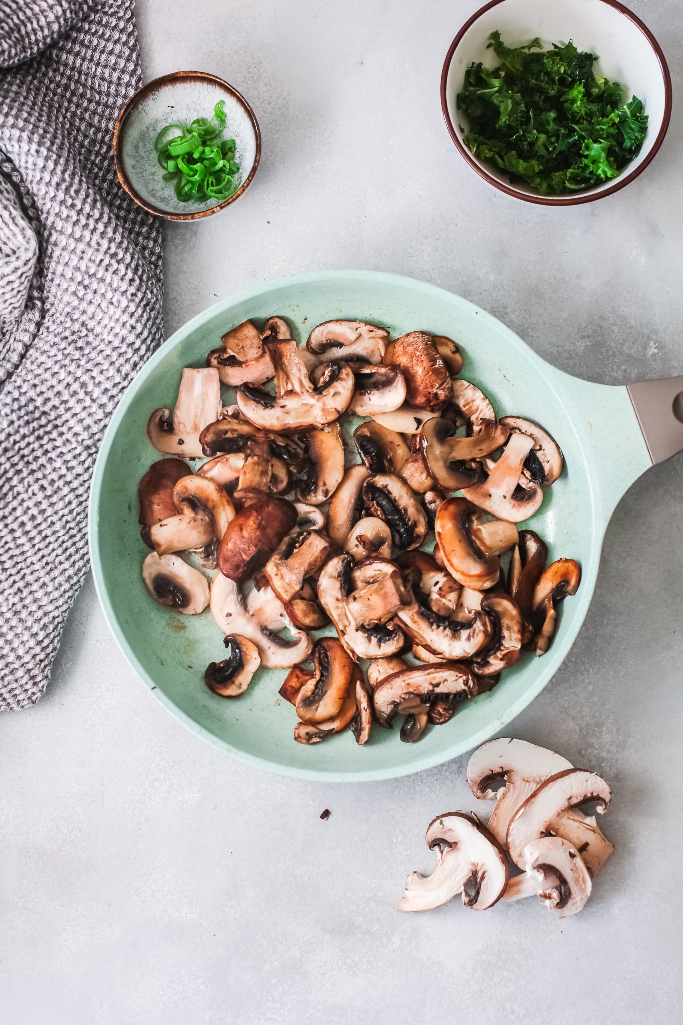 Easy Korean Noodles Recipe mushrooms in skillet.