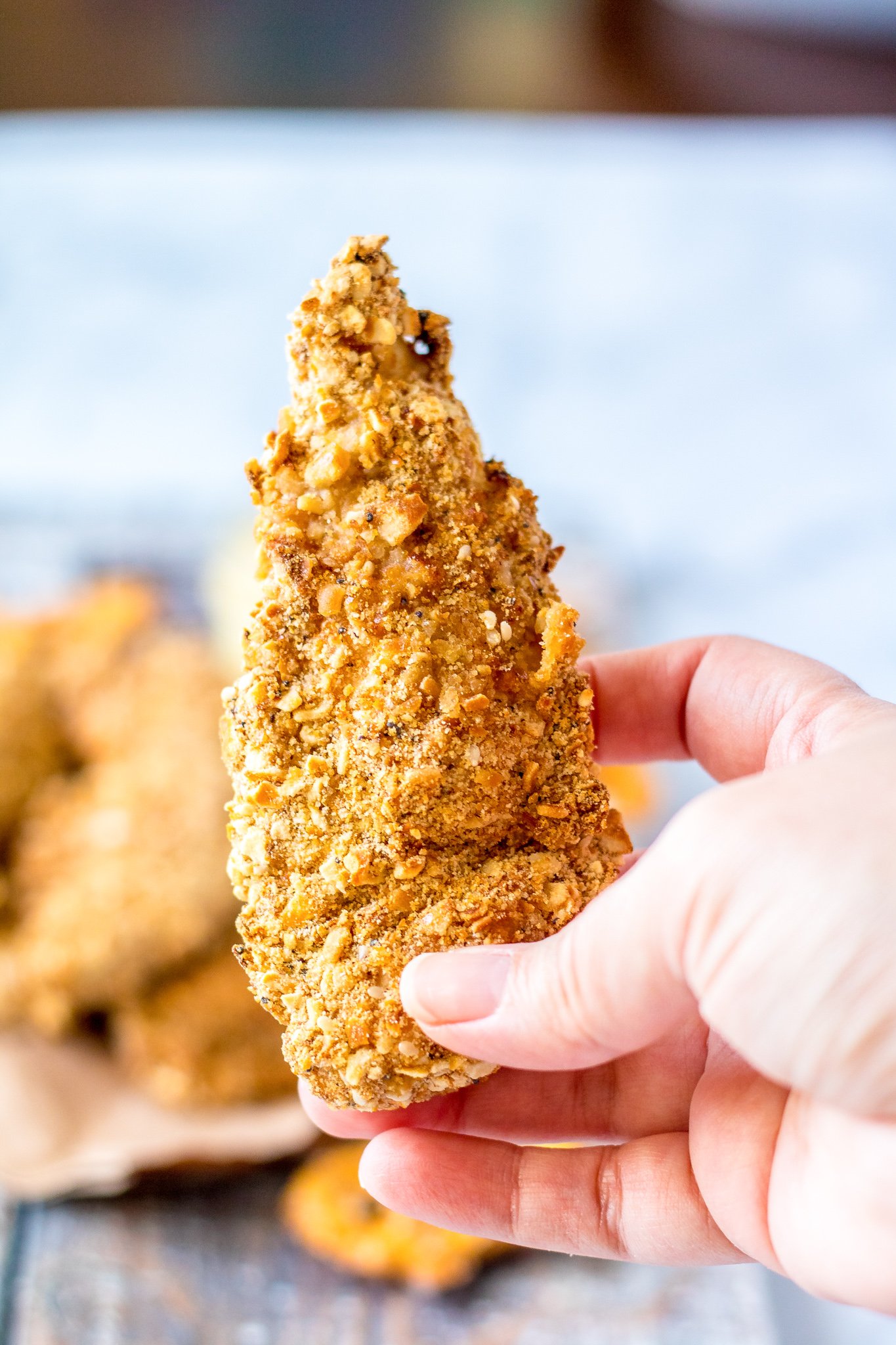 Pretzel Crusted Chicken Recipe in hand.