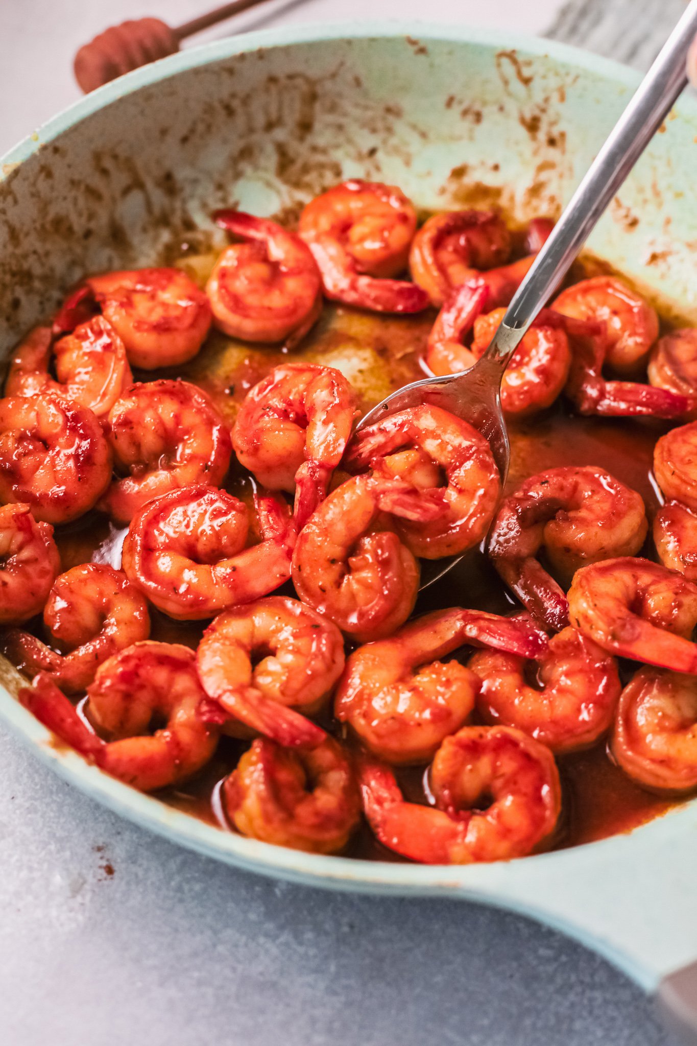 Easy Cajun Shrimp Recipe with spoon.