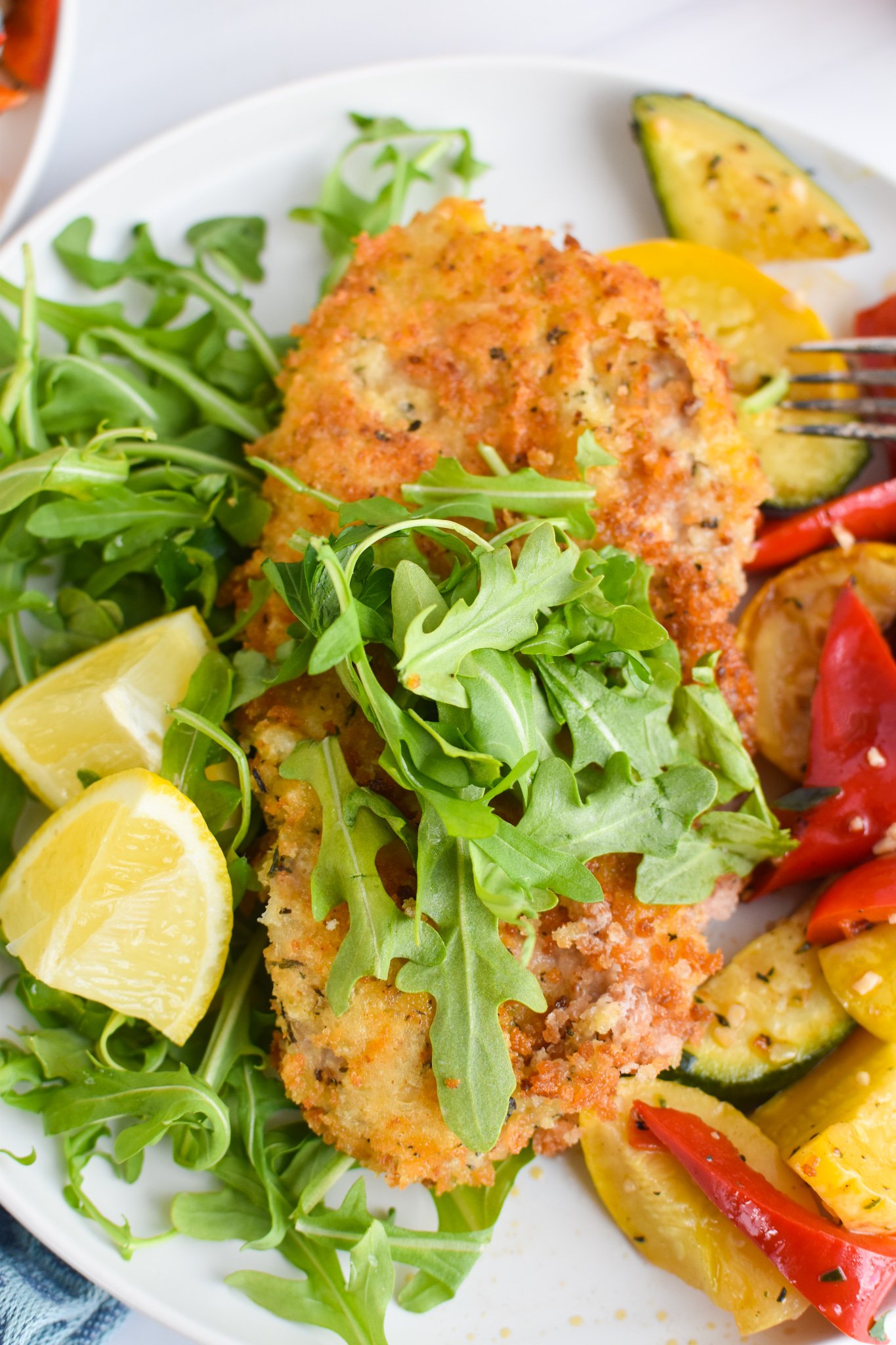 Easy Veal Milanese Recipe with arugula. 